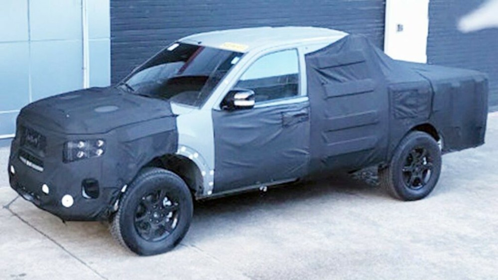 Bán tải mới của Kia lộ diện: Đầu xe long lanh như SUV, cạnh tranh Ford Ranger - Ảnh 1.