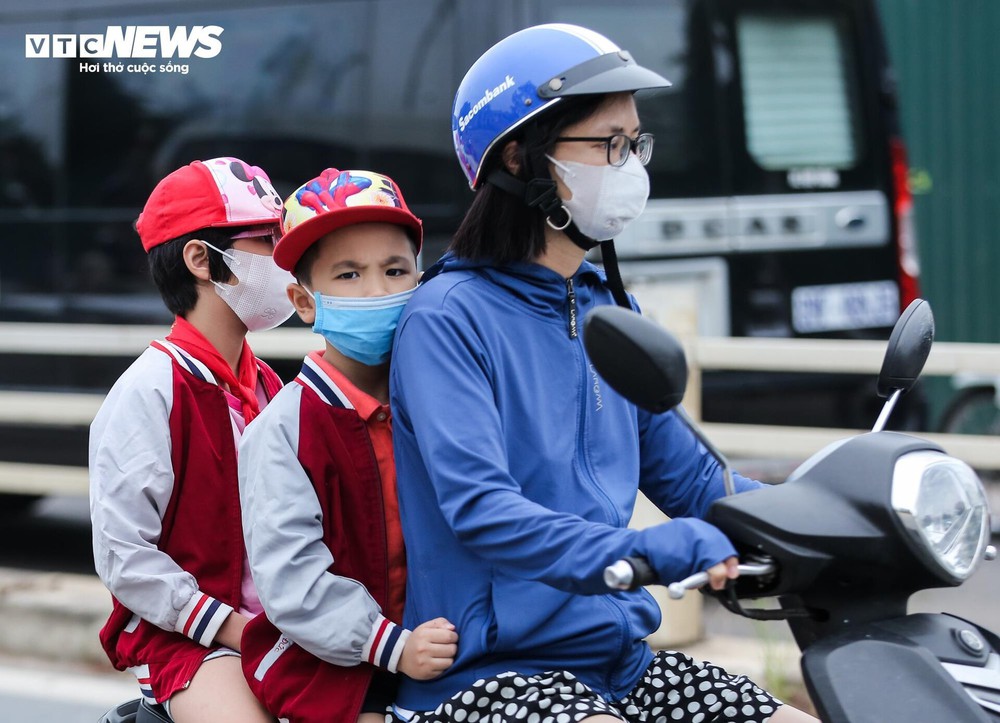 Muôn kiểu đón gió lạnh đầu mùa của người Hà Nội - Ảnh 7.