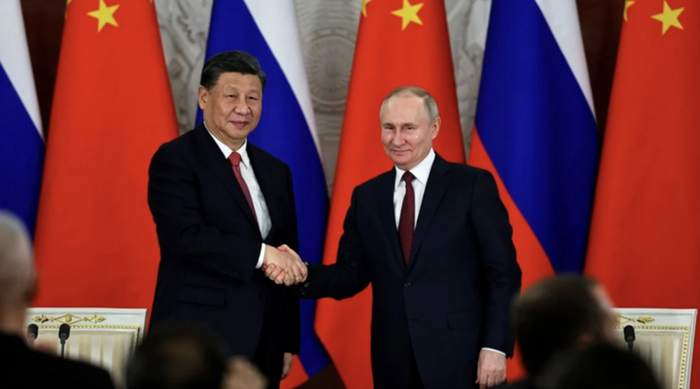 Tổng thống Putin thăm Trung Quốc - Ảnh 1.