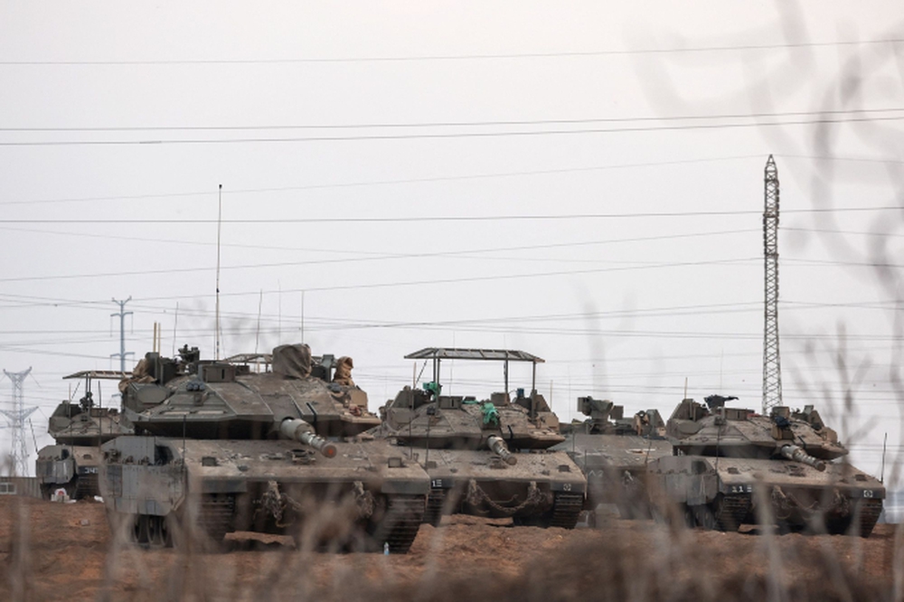 Xe tăng, pháo xếp hàng dài ở biên giới chỉ chờ quân lệnh, vì sao Israel vẫn chưa xuất kích trên bộ vào Gaza? - Ảnh 2.