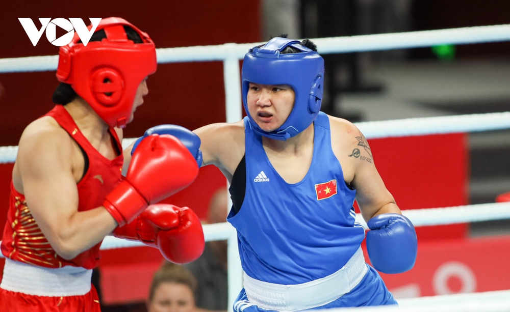 Boxing giành thêm huy chương cho Việt Nam tại ASIAD 19 - Ảnh 1.