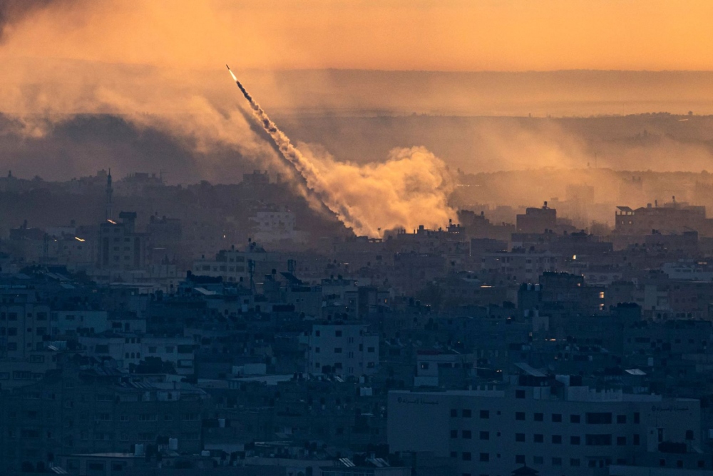 Những hình ảnh kinh hoàng về cuộc chiến giữa Israel và Hamas - Ảnh 30.