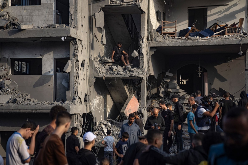 Những hình ảnh kinh hoàng về cuộc chiến giữa Israel và Hamas - Ảnh 17.