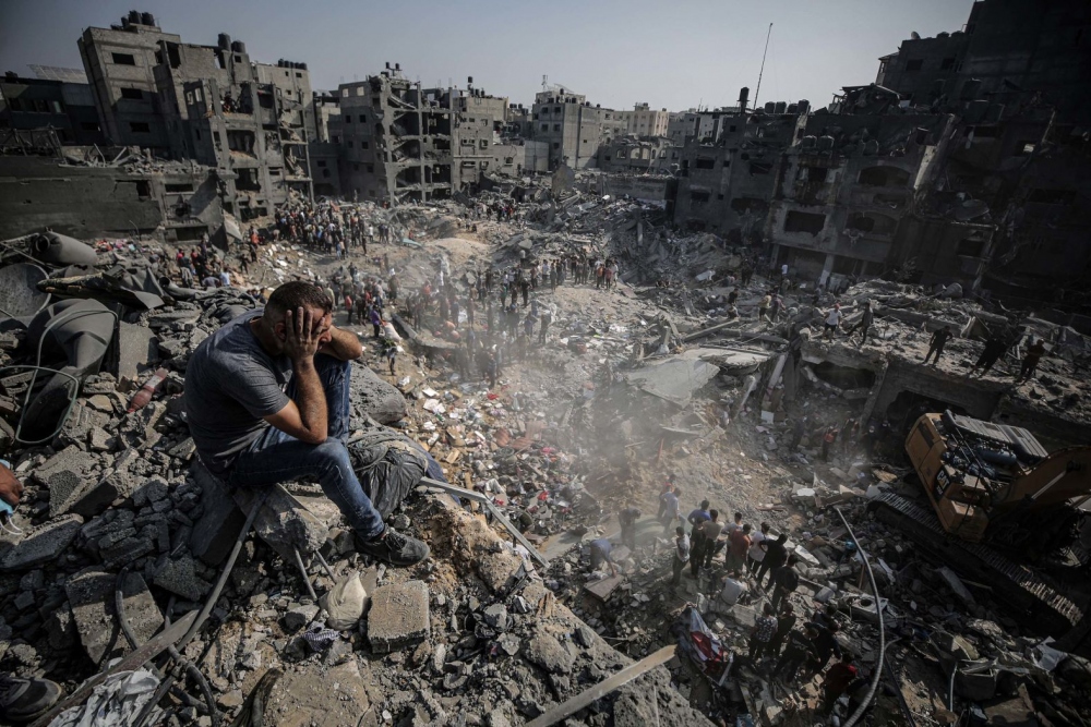 Những hình ảnh kinh hoàng về cuộc chiến giữa Israel và Hamas - Ảnh 14.
