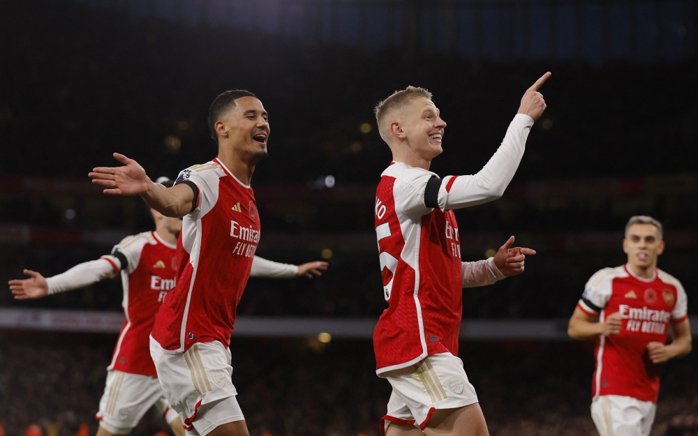 Thắng Burnley trong thế 10 người, Arsenal phả hơi nóng vào gáy Man City - Ảnh 8.