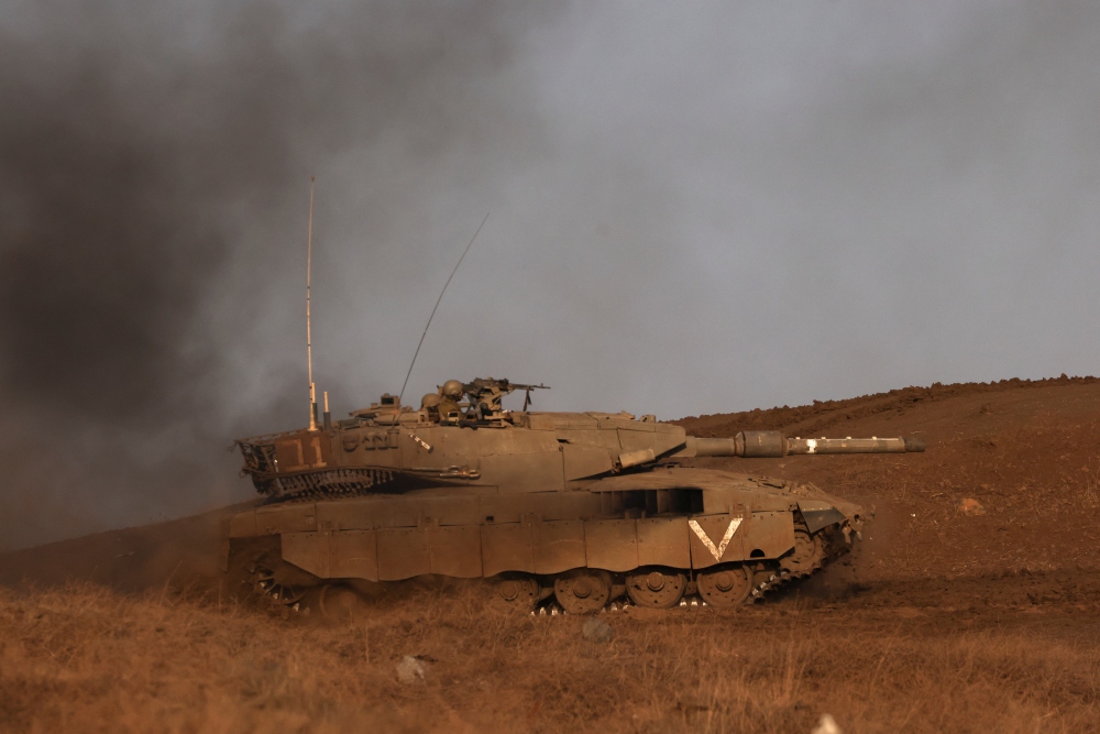 Israel không kích Syria đáp trả việc Cao nguyên Golan bị trúng tên lửa - Ảnh 1.