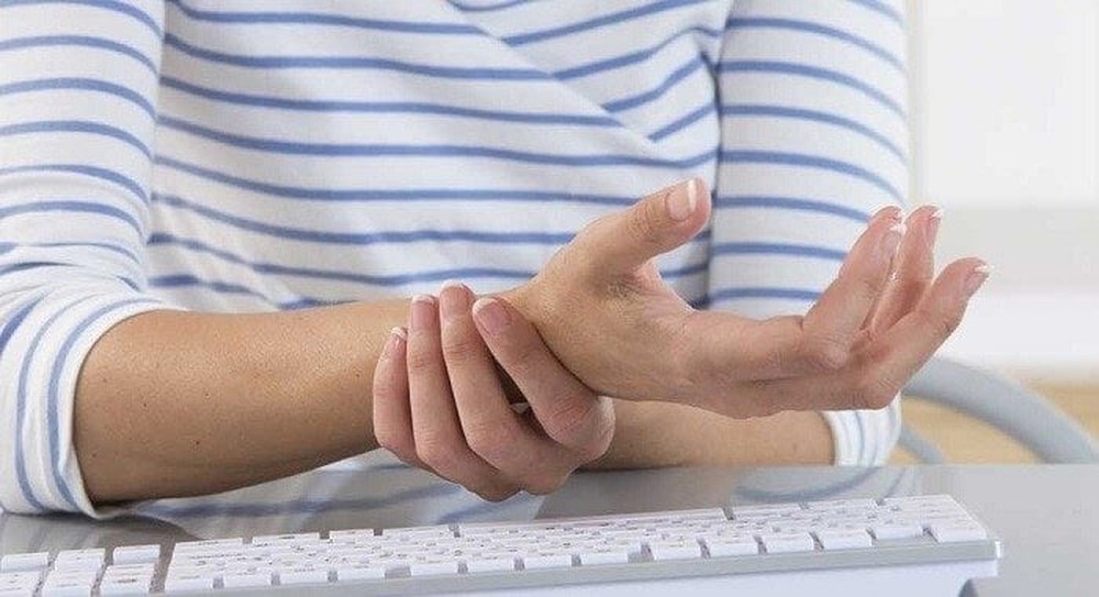 Các cách  giảm đau tay khi gõ bàn phím - Ảnh 1.