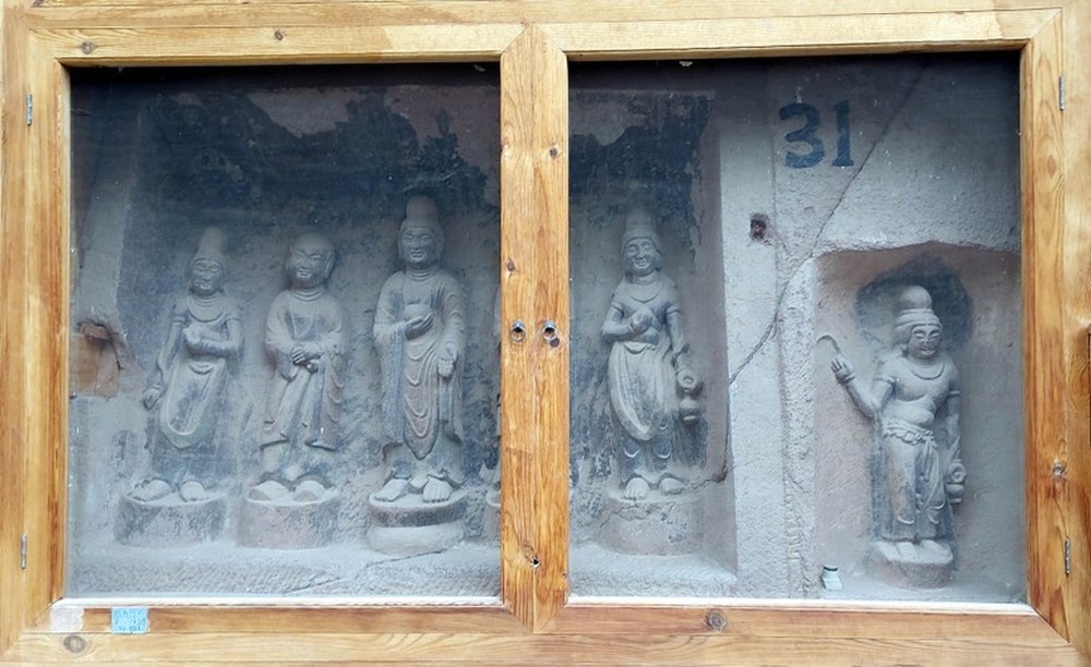 Quần thể tượng đá Phật giáo lâu đời nhất Trung Quốc - Ảnh 8.