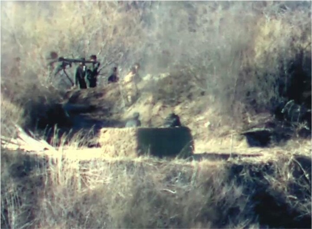 Triều Tiên khôi phục đồn gác, chuyển súng hạng nặng đến biên giới liên Triều - Ảnh 1.