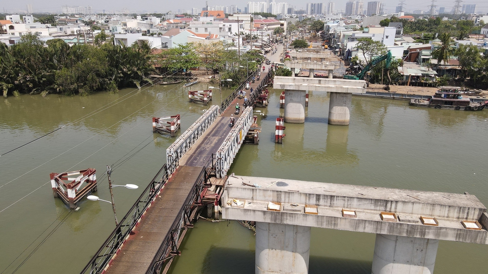 Hiện trạng cây cầu gần 600 tỉ đồng được người dân mong chờ suốt 20 năm ở TP.HCM - Ảnh 1. Hiện trạng cây cầu gần 600 tỉ đồng được người dân mong chờ suốt 20 năm ở TP.HCM - Ảnh 1.