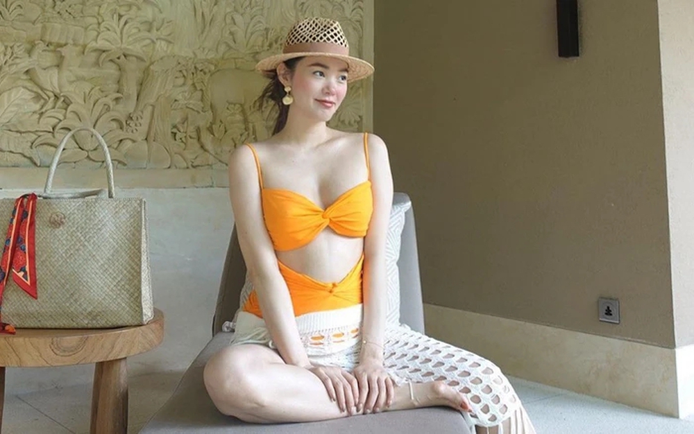 Ngỡ ngàng vóc dáng gợi cảm với bikini của mẹ bầu Minh Hằng - Ảnh 1.