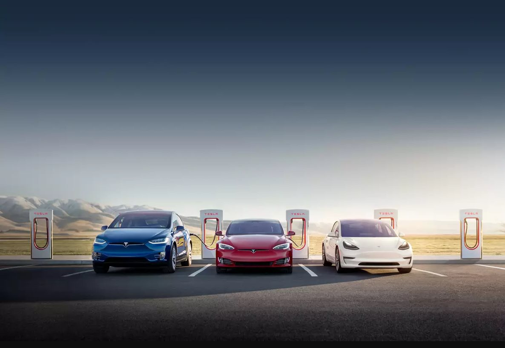 Tesla không ‘hào phóng’, Vinfast không ‘keo kiệt’: Câu chuyện chia sẻ trạm sạc của các đối thủ ngành xe điện - Ảnh 2.