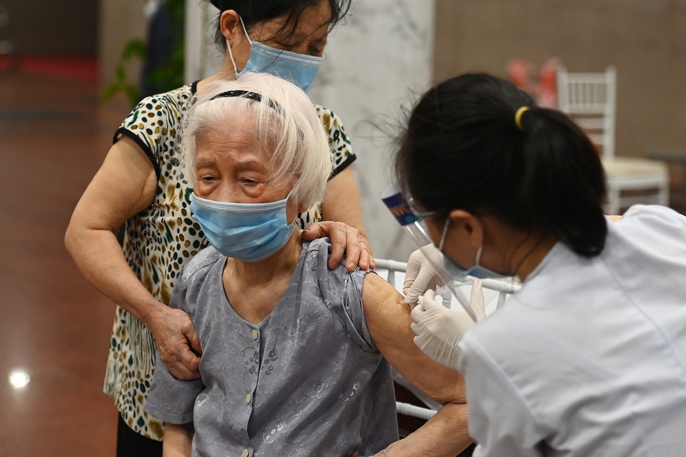Thời gian tới, tiêm vaccine Covid-19 ở Việt Nam thực hiện thế nào? - Ảnh 1.