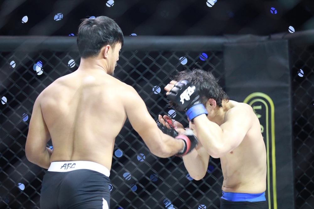 Robson Oliveira thắng knock-out đẳng cấp tại sự kiện MMA AFC 25 - Ảnh 9.