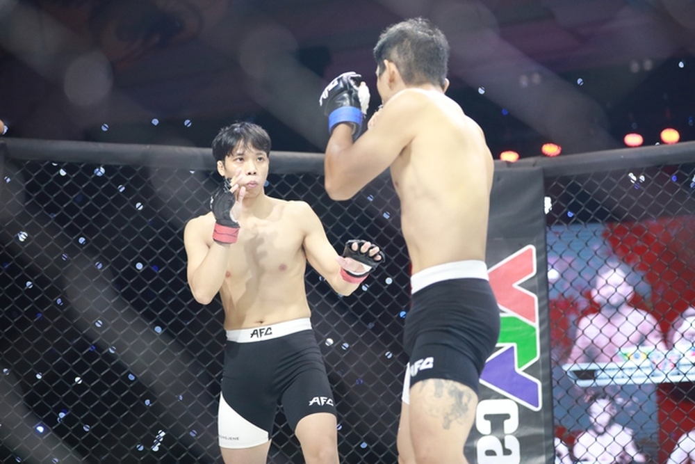 Robson Oliveira thắng knock-out đẳng cấp tại sự kiện MMA AFC 25 - Ảnh 7.