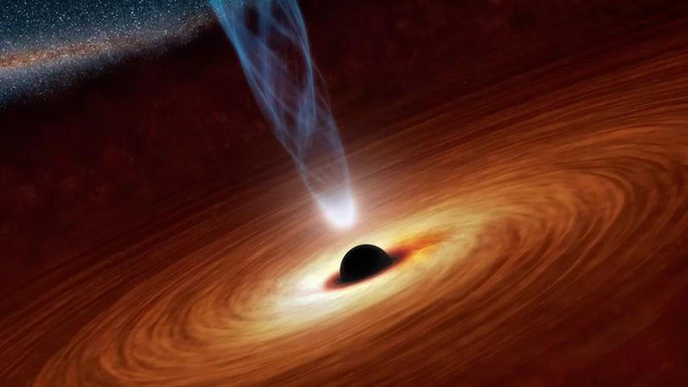 Lỗ đen quái vật gần Trái Đất sống dậy, phát tín hiệu đe dọa - Ảnh 1.