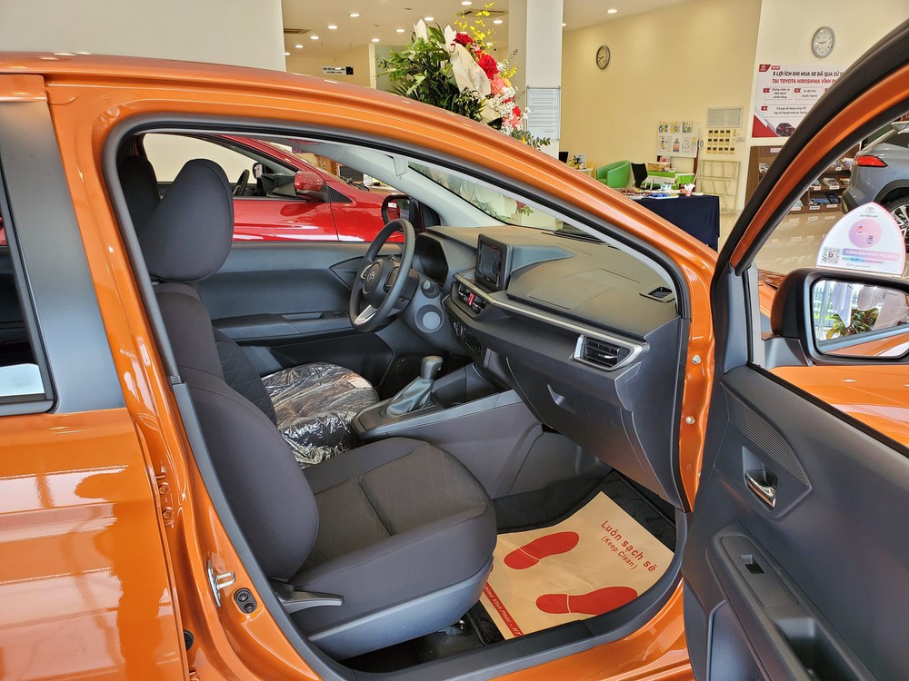 Toyota Wigo 2023 vừa mở bán đã giảm giá: Khởi điểm còn 355 triệu, rẻ nhất phân khúc nhưng vẫn hơn công nghệ an toàn - Ảnh 4.