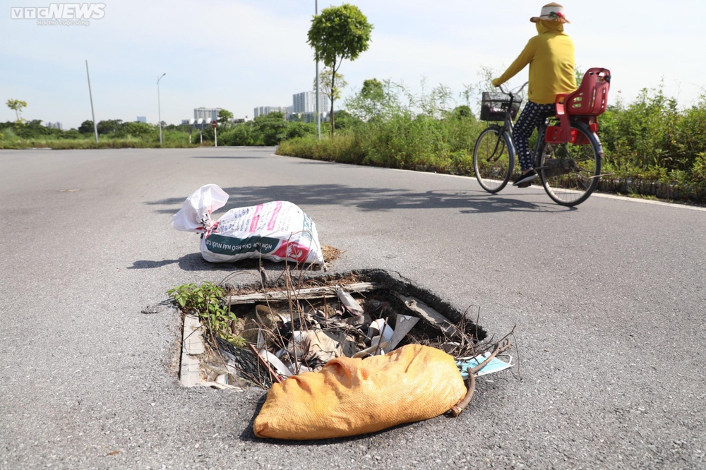 Sau 7 năm quy hoạch, công viên gần 100 ha thành nơi tập kết rác thải, dạy lái xe - Ảnh 9.