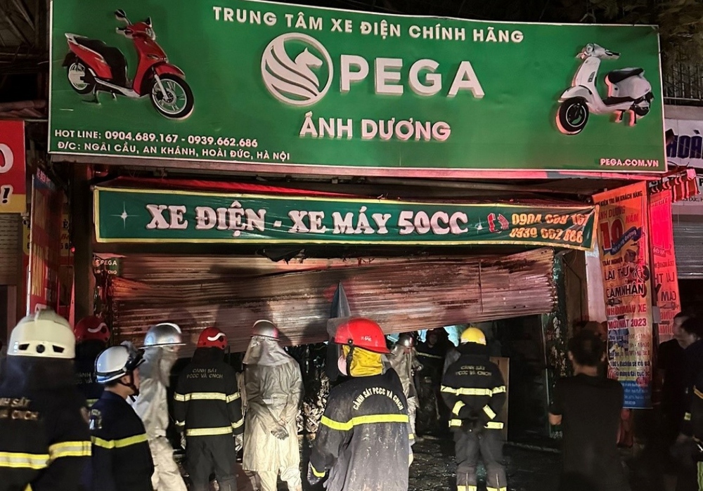 Cháy cửa hàng sửa xe máy khiến 3 người trong 1 gia đình tử vong ở Hà Nội - Ảnh 2.