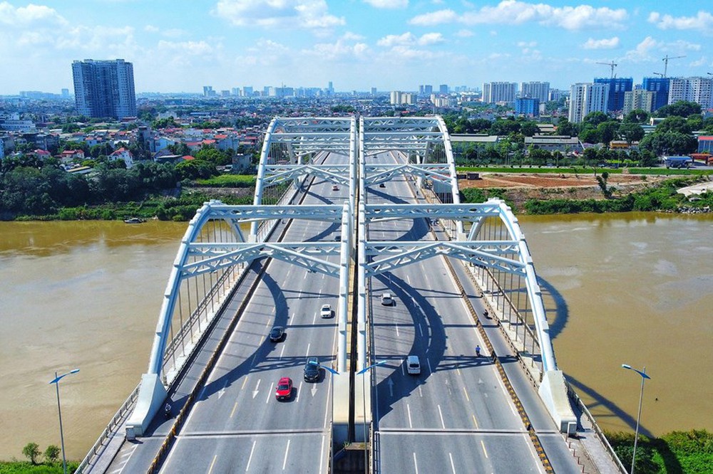 Ngắm cây cầu vòm thép vượt sông rộng nhất Việt Nam sau gần 10 năm khai thác - Ảnh 2.