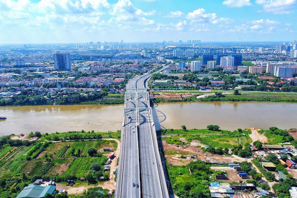 Ngắm cây cầu vòm thép vượt sông rộng nhất Việt Nam sau gần 10 năm khai thác - Ảnh 1.