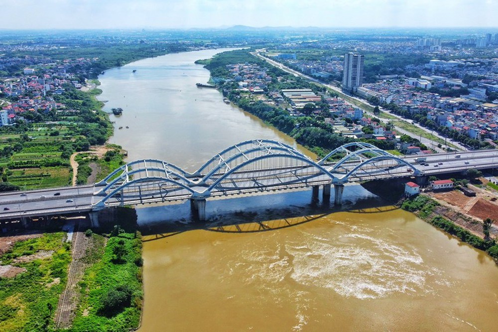 Ngắm cây cầu vòm thép vượt sông rộng nhất Việt Nam sau gần 10 năm khai thác - Ảnh 8.