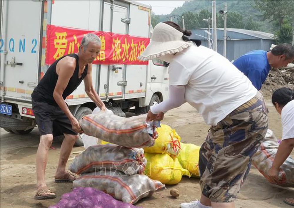 Lũ lụt ở Trung Quốc có thể gây áp lực lên giá lương thực toàn cầu - Ảnh 3.