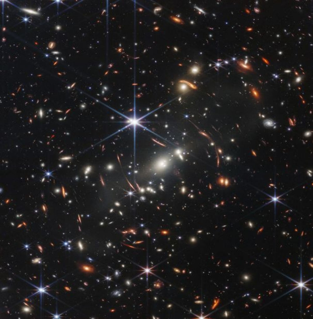 Kính thiên văn James Webb ghi lại hình ảnh ngôi sao xa xôi nhất trong vũ trụ - Ảnh 1.