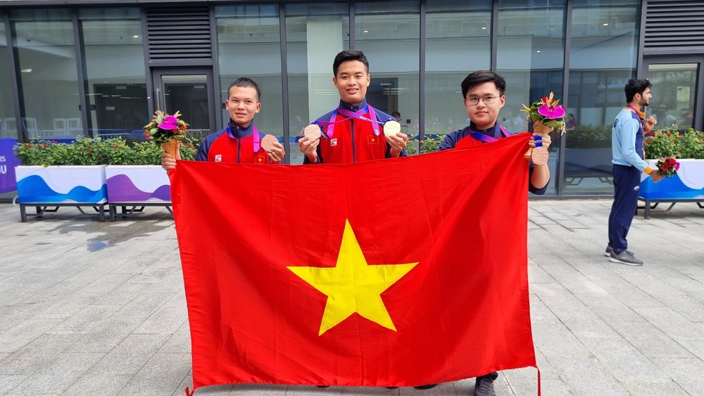 HCV Asiad 2022 đầu tiên của Việt Nam: 2 tuổi theo bố mẹ vào trung tâm huấn luyện; đánh bại nhà vô địch thế giới để đăng quang - Ảnh 3.
