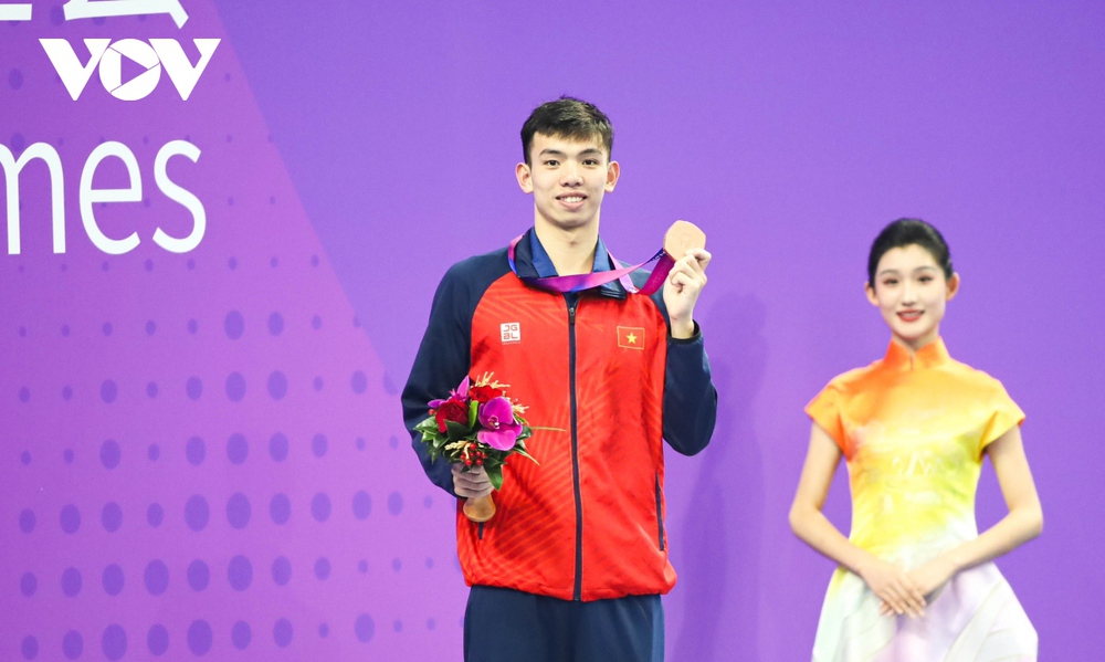 Huy Hoàng nói gì sau khi giành HCĐ ASIAD 19 và đạt chuẩn A Olympic Paris? - Ảnh 1.