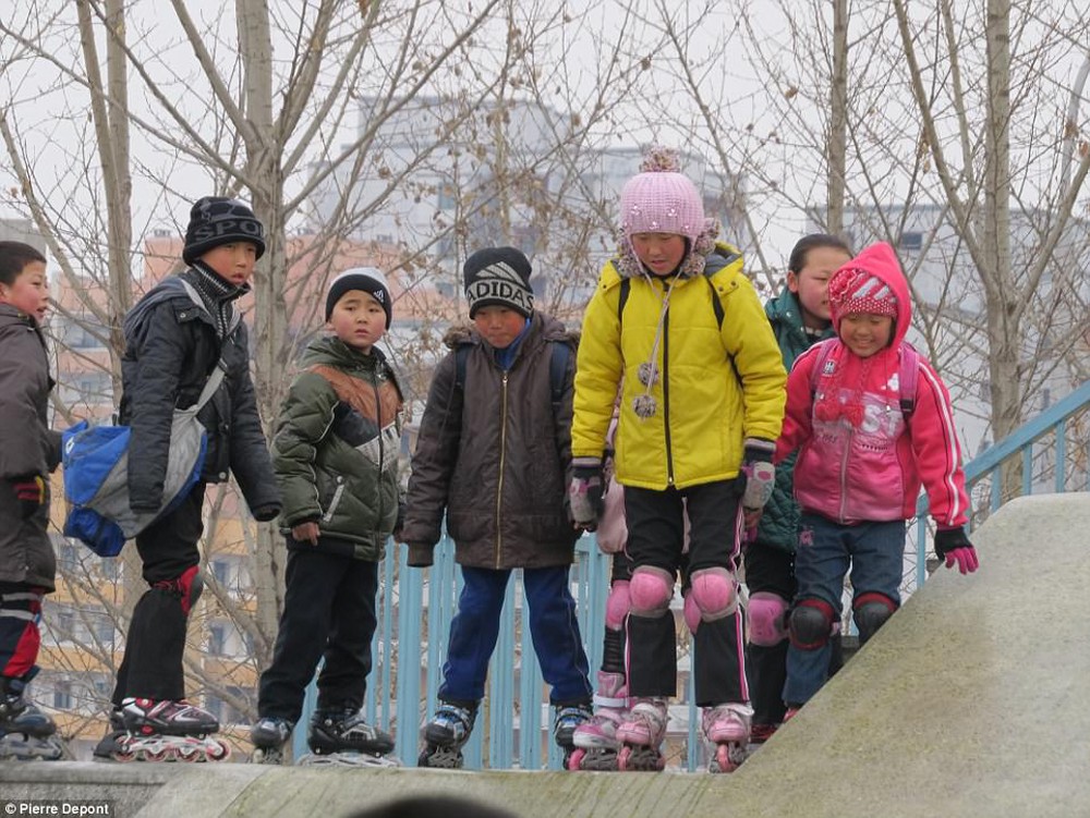 Cuộc sống đời thường của trẻ em Triều Tiên qua góc nhìn của nhiếp ảnh gia nước ngoài - Ảnh 6.