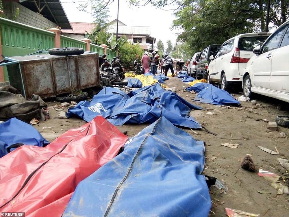 Những hình ảnh tang thương do thảm họa động đất, sóng thần ở Indonesia - Ảnh 8.