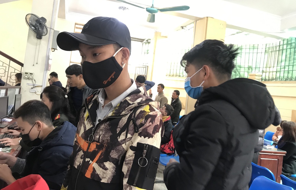 Nghệ An: Đeo khẩu trang đi làm hộ chiếu, tạm hủy kế hoạch sang Trung Quốc lao động vì lo ngại virus corona - Ảnh 9.