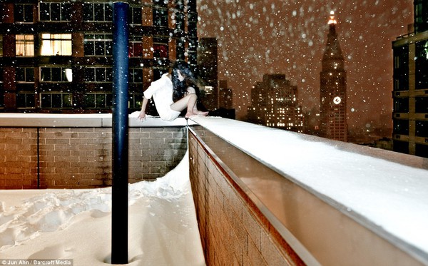 This amazing image captures Jun Ahn frozen in a snow storm as the wind whips through her hair