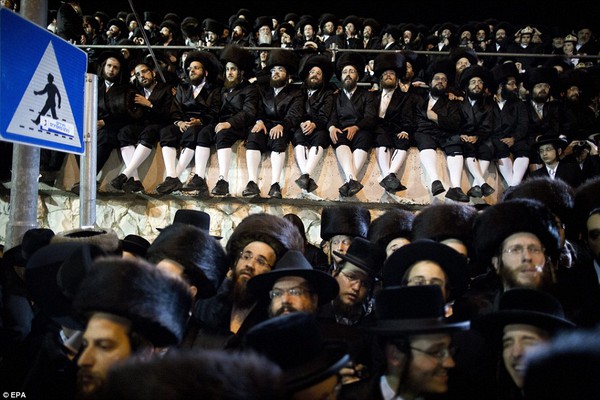 Matching outfits: Hasidic Jews wear clothes similar to that of their ancestors. They can be seen in traditional shtreimel hats for the wedding ceremony 