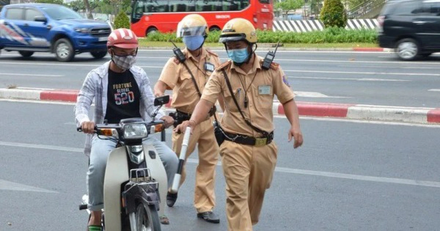 Hành vi chống đối, cản trở và gây nguy hiểm cho Cảnh sát giao thông sẽ bị xử lý như thế nào?- Ảnh 2.