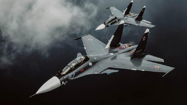 F-18 có động tác nguy hiểm với Su-30 - Ảnh 4.