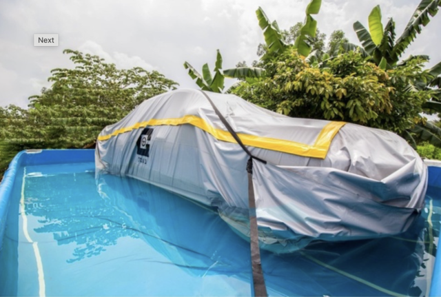 Dùng bạt chống ngập ô tô trong mùa mưa bão: Cẩn thận 'tiền mất tật mang'- Ảnh 1.