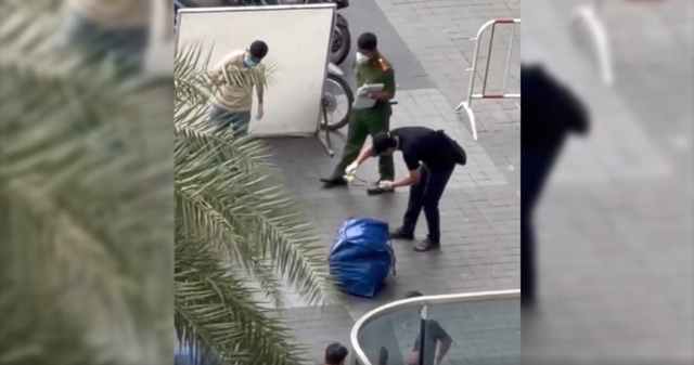 Vụ ph&aacute;t hiện thi thể trong t&uacute;i trước sảnh chung cư ở TP.HCM: H&eacute; lộ về nạn nh&acirc;n v&agrave; 2 nghi phạm - Ảnh 1.