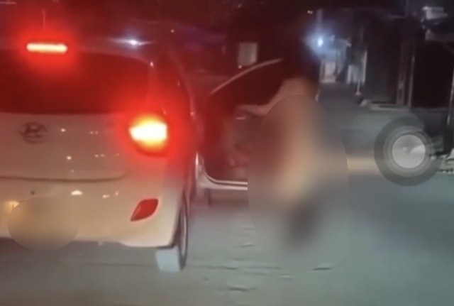 Danh tính người phụ nữ không mặc đồ rơi khỏi xe ô tô ở Nghệ An  - Ảnh 1.