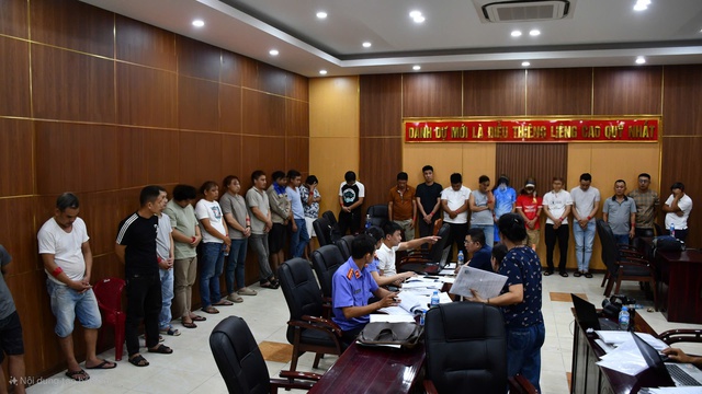 Khám xét khẩn cấp nơi ở của 2 'ông trùm' Nguyễn Minh Trí, Huỳnh Văn An, thu giữ 15.000 trang dữ liệu - Ảnh 1.