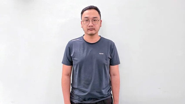 Bắt tạm giam nhân viên ngân hàng Cao Minh Thuận - Ảnh 1.