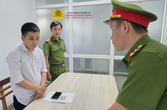 Bắt tạm giam nhân viên bảo hiểm Nguyễn Minh Quang - Ảnh 1.