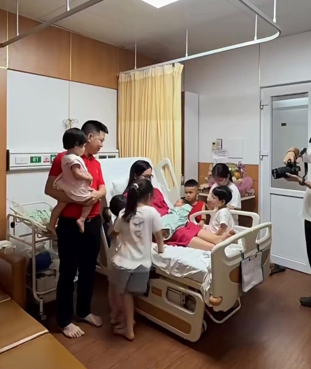 Người phụ nữ 31 tuổi ở H&agrave; Nội sinh con thứ 7 sau 9 năm kết h&ocirc;n - Ảnh 1.