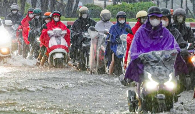 Tin gió mùa đông bắc mới nhất: Ngày mai, miền Bắc mưa to, nhiệt độ giảm rất mạnh - Ảnh 1.