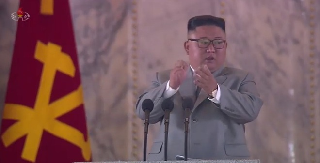 Chủ tịch Triều Tiên Kim Jong-un có bài phát biểu hiếm hoi trong lễ duyệt binh mừng ngày thành lập đảng - Ảnh 1.