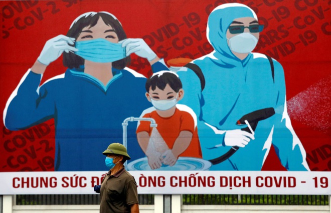Việt Nam: Quốc gia chiến thắng hiếm hoi thời đại dịch - Ảnh 1.