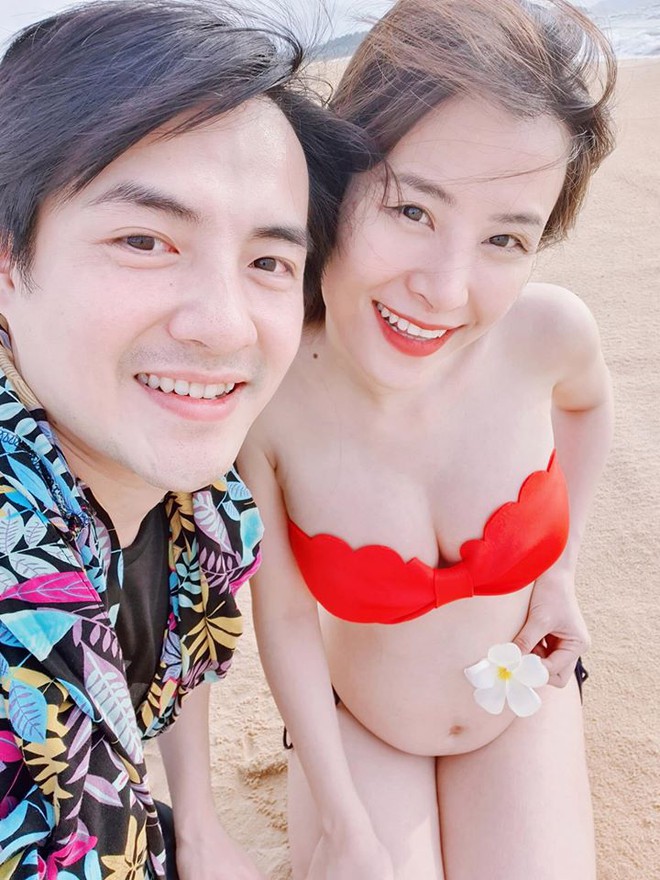 Đông Nhi ngại ngùng đăng ảnh bikini nóng bỏng ở tháng thứ 5 của thai kì - Ảnh 2.