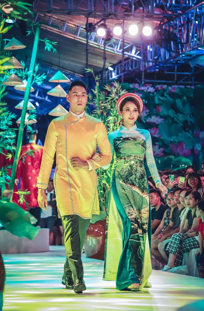 Cầu thủ bóng rổ làm vedette trong show áo dài của NTK Nhật Dũng - Ảnh 3.