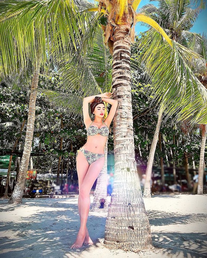 Hoa hậu Diễm Hương tung loạt ảnh bikini nóng bỏng - Ảnh 1.